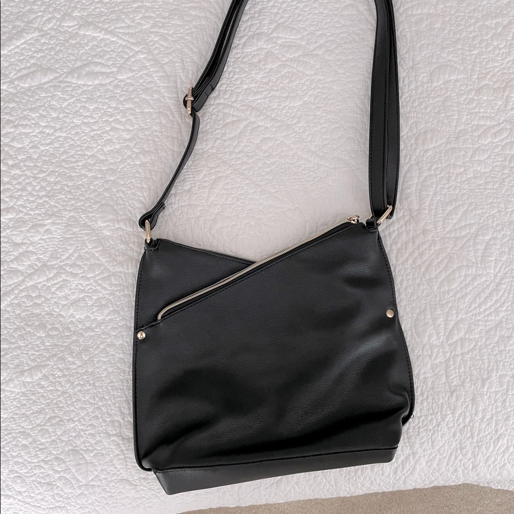 Angled double zippered and sided purse